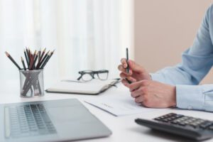 office-desktop-with-laptop-calculator