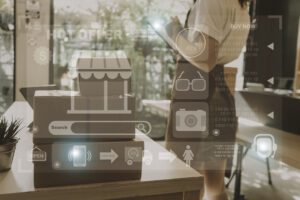 Attractive Asian SME business woman working at home office. onli