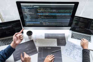 Team of developer programmer working on project in software deve